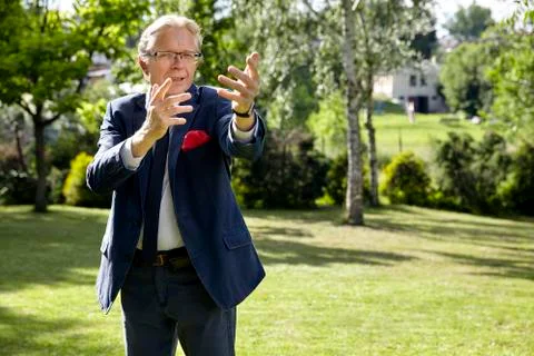Gesticulate man in the garden Stock Photos