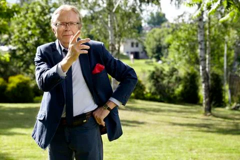 Gesticulate man in the garden Stock Photos