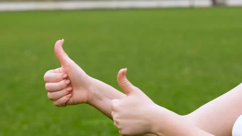 Gesticulation by female hands. Thumbs up, hand movement, close-up. Stock-Footage 280708692