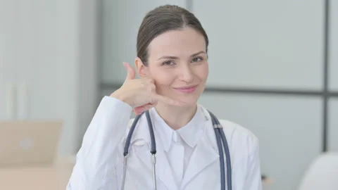 Gesture of Call Me for Consultation and Help by Young Doctor 스톡 동영상 233385232
