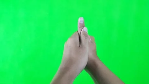 Gesture of holding thumb because of pain or hurt on green screen background Stock Footage 302632971