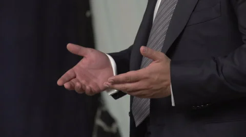 Gestures hands man in suit  Stock Footage 59832379