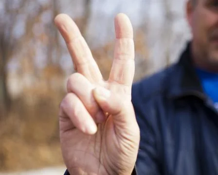 Gestures by hands Stock Photos