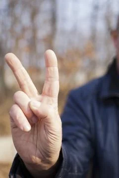 Gestures by hands Stock Photos