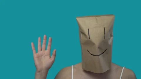 Gestures. With smile, man waves goodbye and shows at that fack. Drawn on the box Stock Footage 131112579