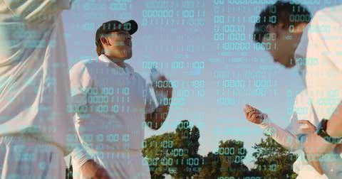 Gesturing man in black-cap and teammates in white-polos standing on grass, 스톡 사진