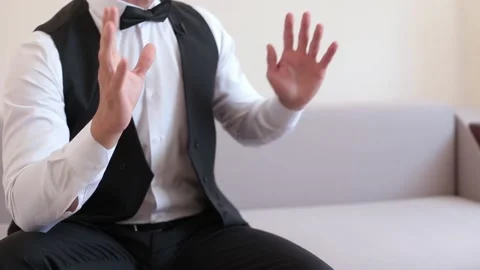 Gesturing a talking man dressed in business suit giving an interview. Stock Footage 133929319