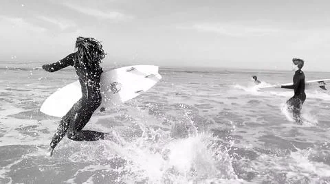 Get adrenaline rush while surfing Stock Photos