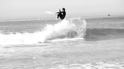 Get adrenaline rush while surfing Fotos de archivo