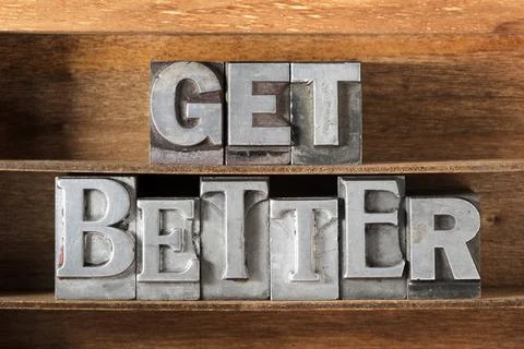 Get better tray get better phrase made from metallic letterpress type on w... Stock Photos