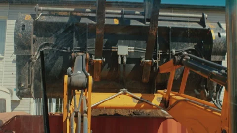 Get a bird's-eye view of a bustling construction site as powerful machinery Stock Footage 244461205