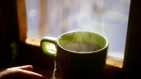 Get a cup of hot water with tea bag A red, back and forth, to brew a delicious Stock Footage 72982364