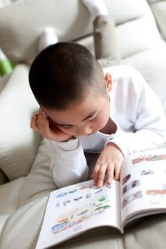 Get down. Thinking Vertical composition Read a book. Look. Learning Oriental Stock Photos