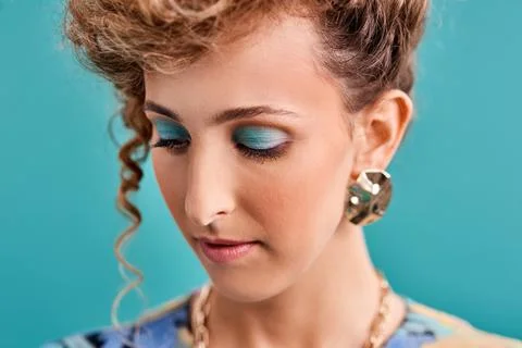 Get dressed, put on some makeup and add some bling. Studio shot of a beautiful Stock Photos