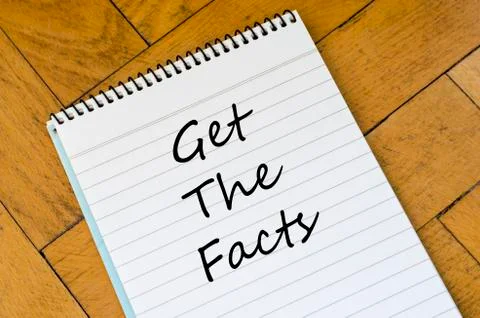 Get the facts concept on notebook Stock Photos