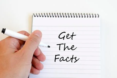 Get the facts concept on notebook Stock Photos