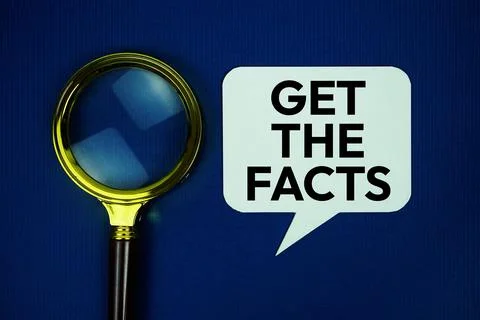 Get the facts text on speech bubble with magnifying glass top view on blue .. Stock Photos