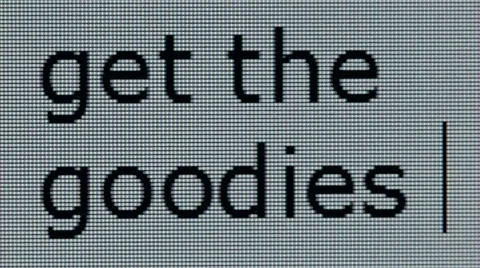 "get the goodies" being typed on a computer screen in close up Stock Footage 54250318