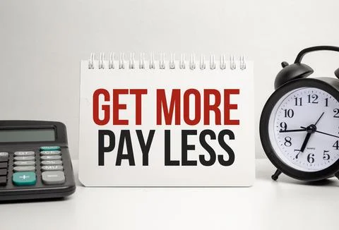 Get more pay less words with calculator and clock with notebook Stock Photos