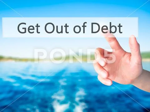 Get Out of Debt - Hand pressing a button on blurred background c Stock Photos