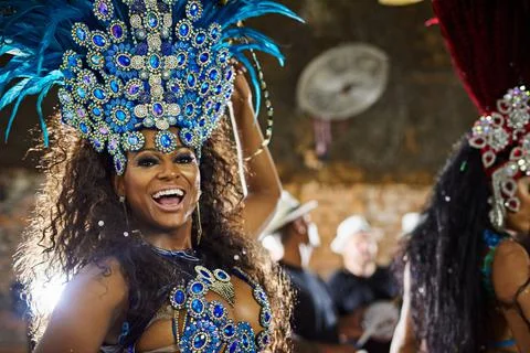 Get ready for an electrifying performance. Portrait of a samba dancer perform Stock Photos