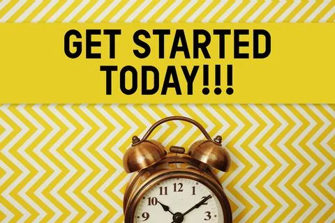 Get Started Today text with alarm clock on yellow background Stock Photos