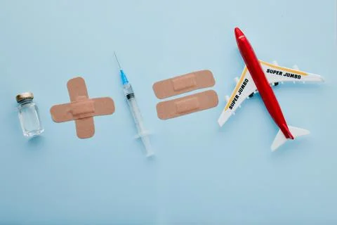 Get vaccinated so you can travel. High angle shot of a Covid vaccine and needle Stock Photos