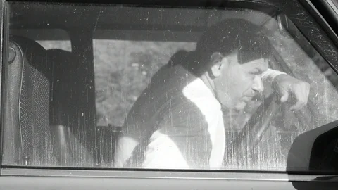 Gets in the car, side view Stock Footage 112917533