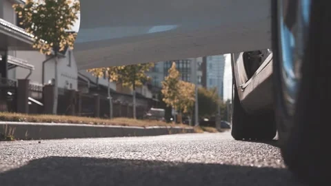 Gets Out Of Car Tesla Dr Martens boots Stock Footage 140392906