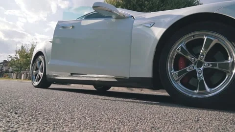 Gets Out Of Car Tesla Stock Footage 140392854