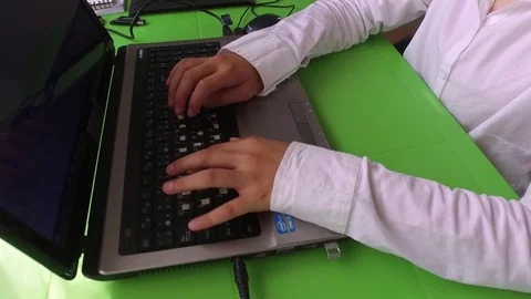 Gets text on the laptop Stock Footage 78043161