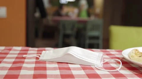 Getting back to normal: going to a restaurant during a pandemic. Disposable Video stock 162401657