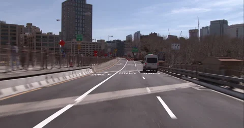 Getting off the Brooklyn Bridge into Brooklyn Stock Footage 51258874
