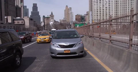 Getting onto the Brooklyn Bridge in downtown Manhattan Stock Footage 51239100