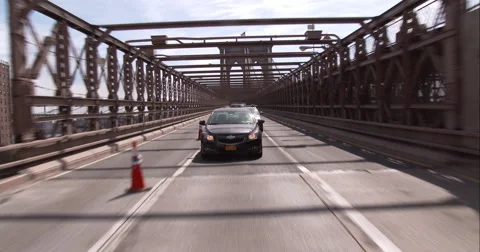 Getting off the Brooklyn Bridge into Manhattan Stock Footage 51238796