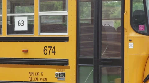Getting on bus Stock Footage 30466573