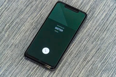 Getting a call from sister concept Photos