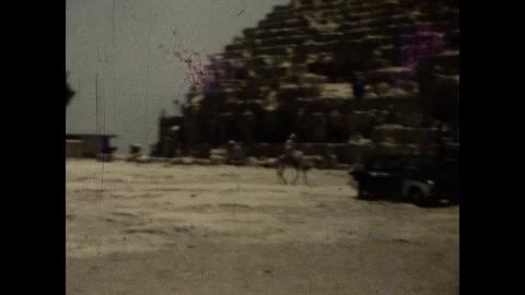 Getting on Camels by the Pyramids Stock Footage 252089337