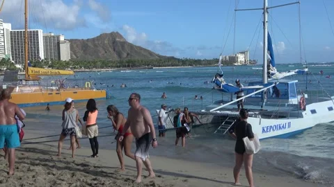 Getting Off Catamaran Boat Under Diamond Head On Waikiki Beach, Honolulu, Hawaii Stock Footage 154356353