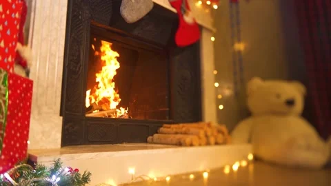 Getting close view to fire in fire place on Christmas Stock Footage 161305060