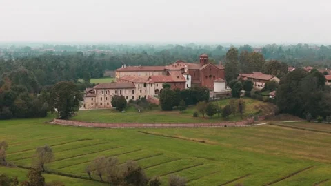 Getting closet Abbazia Morimondo top shot in the countryside of Lombardia Stock Footage 253771285