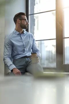 Getting distracted from work by looking outdoors Stock Photos