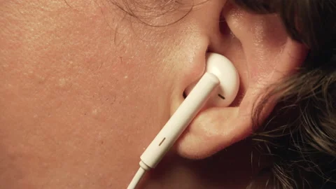 Getting Earphone Out of Ear Stock Footage 157899013