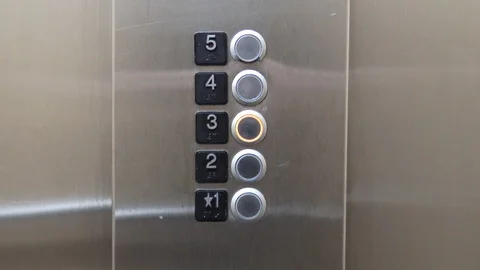 Getting off on elevator level 3 with doors opening Stock Footage 89459323