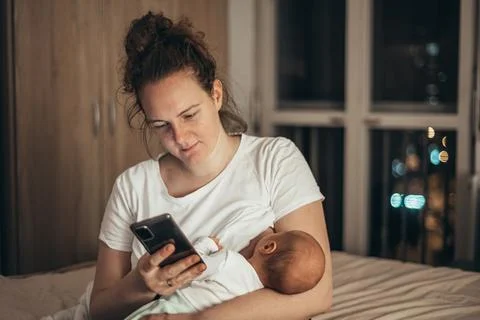 Getting a few tips from other moms Stock Photos