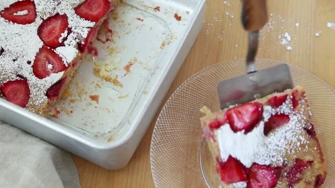 Getting a helping of strawberry cake Stock Footage 95198479