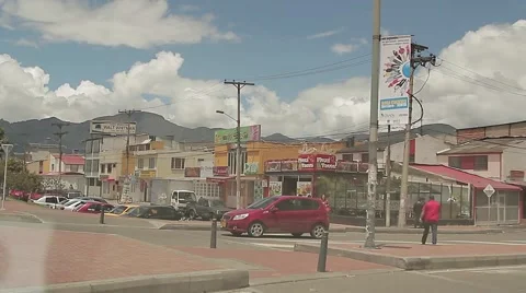 Getting off highway arriving at Mall in poor south side area of Bogota Video stock 54937772