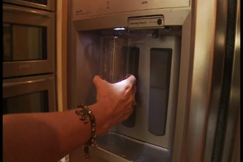 Getting ice water 2 Stock Footage 7812776