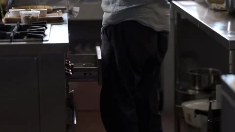 Getting ingredients from drawer in a kitchen  Stock Footage 145355146