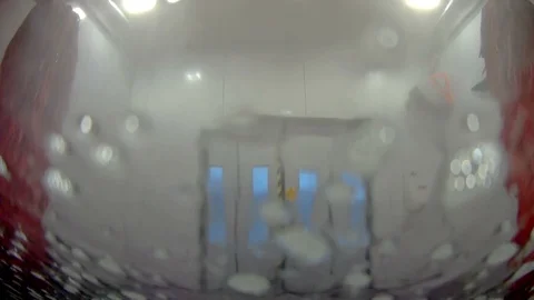 Getting inside the carwash station in the city side Stock Footage 88630477
